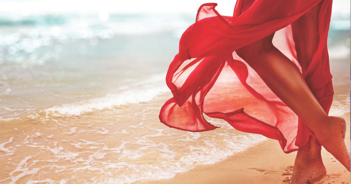 beautiful legs on the beach red dress