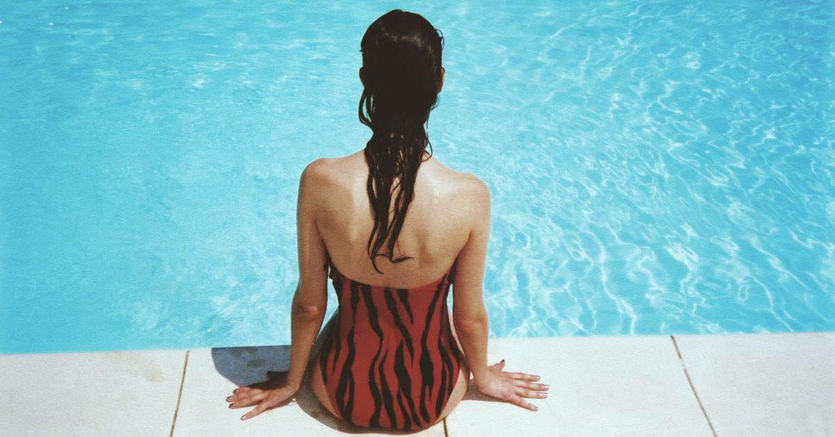 woman back by the pool