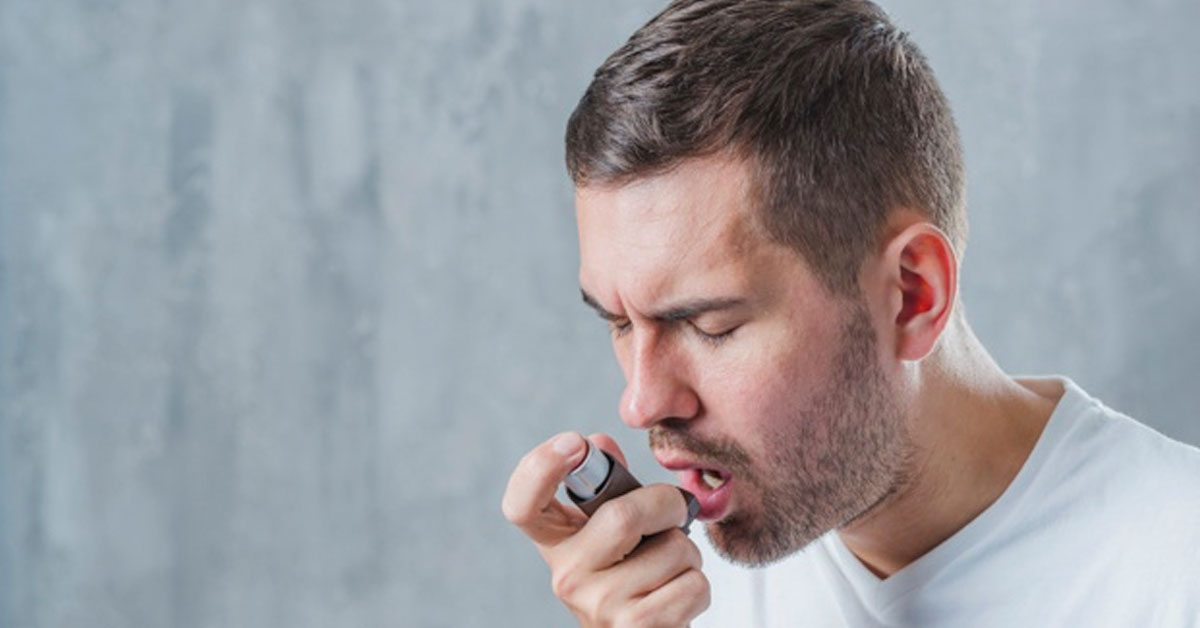 man inhaler asthma