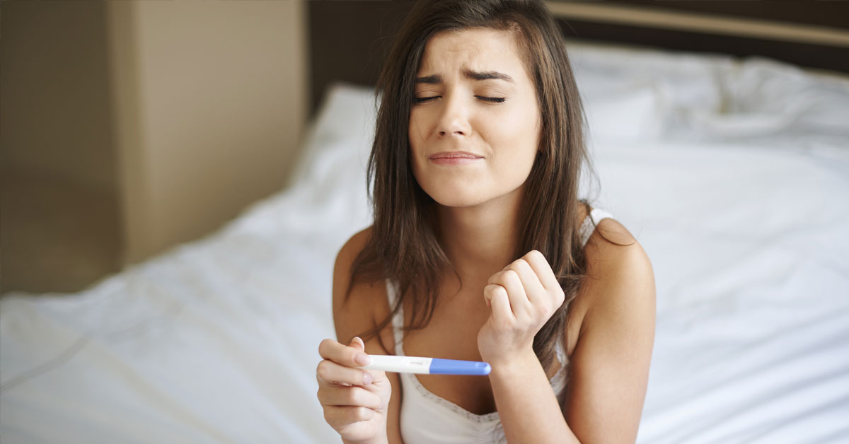 woman-holding-pregnancy-test