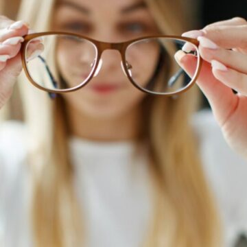 woman-holding-glasses-min-1024x672-1