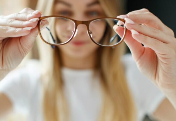 woman-holding-glasses-min-1024x672-1