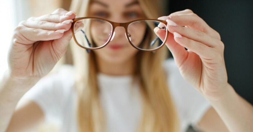 woman-holding-glasses-min-1024x672-1
