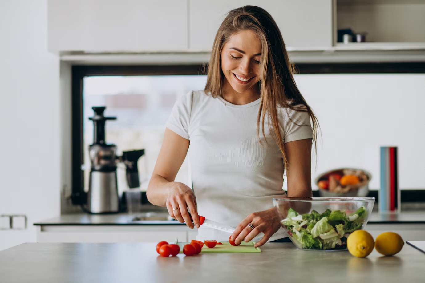 young-woman-making-salad-kitchen_1303-20191